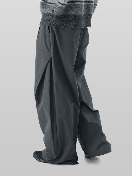 3D Side Cross Tuck Pants gray-1 – Front view | wide-leg / pleated / relaxed tailoring | UNPROVEN