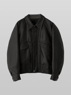 Artificial Grain Flight Blouson charcoal – Front view | architectural outerwear / structured | UNPROVEN
