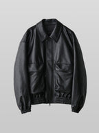 Artificial Grain Short Blouson black – Front view | architectural outerwear / structured | UNPROVEN