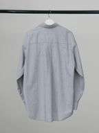 Cut-Off Hem Stripe Shirt – Back view | relaxed tailoring / semi-wide fit | UNPROVEN