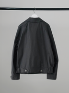 Curved Blouson Jacket charcoal – Back view | architectural outerwear / structured | UNPROVEN