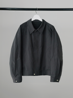 Curved Blouson Jacket charcoal – Front view | architectural outerwear / structured | UNPROVEN
