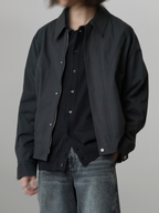 Curved Blouson Jacket charcoal – Front view | architectural outerwear / structured | UNPROVEN