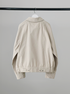 Curved Blouson Jacket – Back view | architectural outerwear / structured | UNPROVEN
