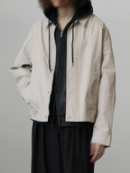 Curved Blouson Jacket – Front view | architectural outerwear / structured | UNPROVEN