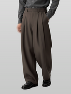 Pintuck Wide Pants dark-beige – Front view | wide-leg / pleated / relaxed tailoring | UNPROVEN